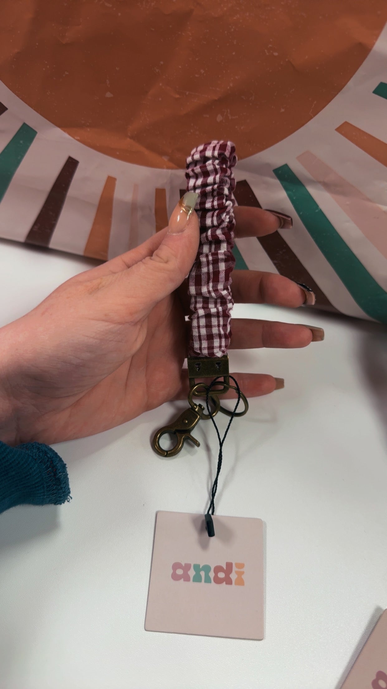 Shop Andi Wristlet Keychain- Maroon Plaid